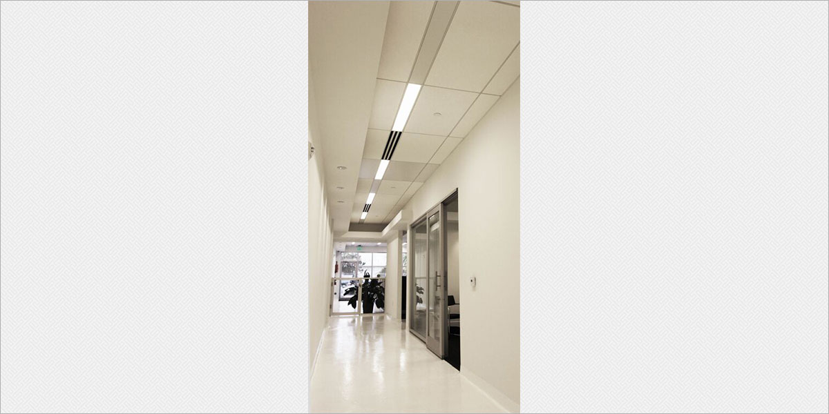 Zumtobel Plateau recessed fluorescent fixtures in the office corridor.